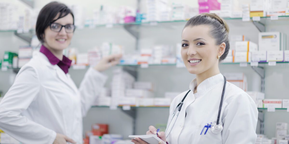 Team,Of,Pharmacist,Chemist,Woman,Group,Standing,In,Pharmacy,Drugstore