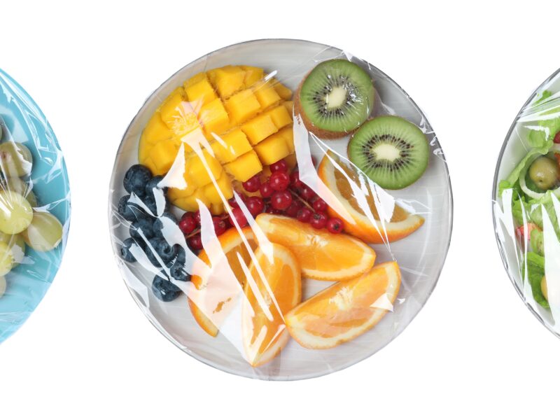 Top,View,Of,Plates,With,Different,Products,Wrapped,With,Stretch