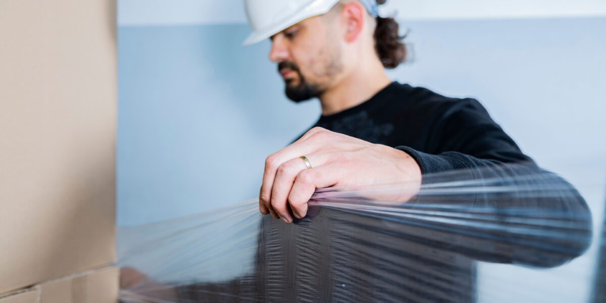 Man with stretch film